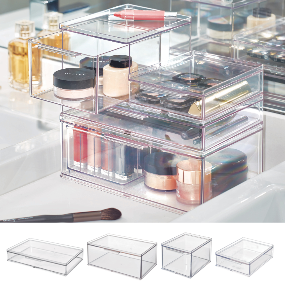 The iDesign HOME EDIT modular organizer with drawer—various sizes—offers transparent storage for lipsticks, powder, brushes, and jars on the bathroom shelf. Four separate, modular organizers with drawers are shown below.