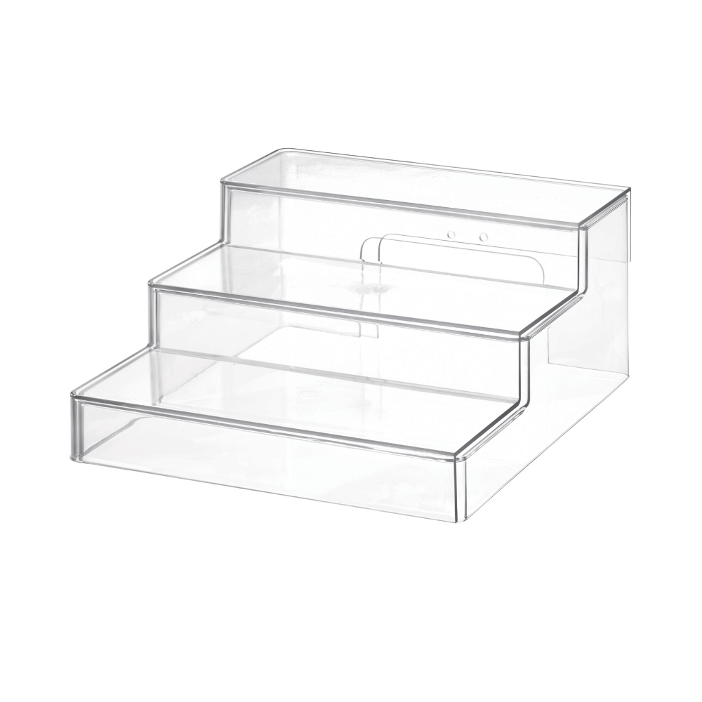 Das iDesign HOME EDIT - Küchen- und Gewürzregal KLAR - ausziehbar ist ein dreistufiges Ordnungssystem aus klarem Acryl mit abgestuften Einlegeböden, ideal für Gewürze, Kosmetika oder Büroartikel. Sein Design gewährleistet eine gute Sichtbarkeit und einen leichten Zugriff für eine vielseitige Nutzung in jedem Raum.